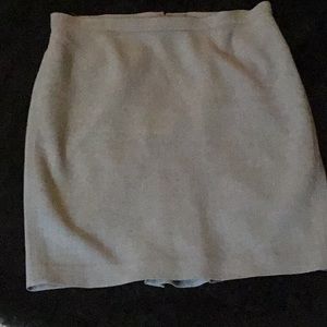 Woman’s gray skirt